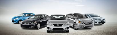 Fleet of rental cars ready for hire